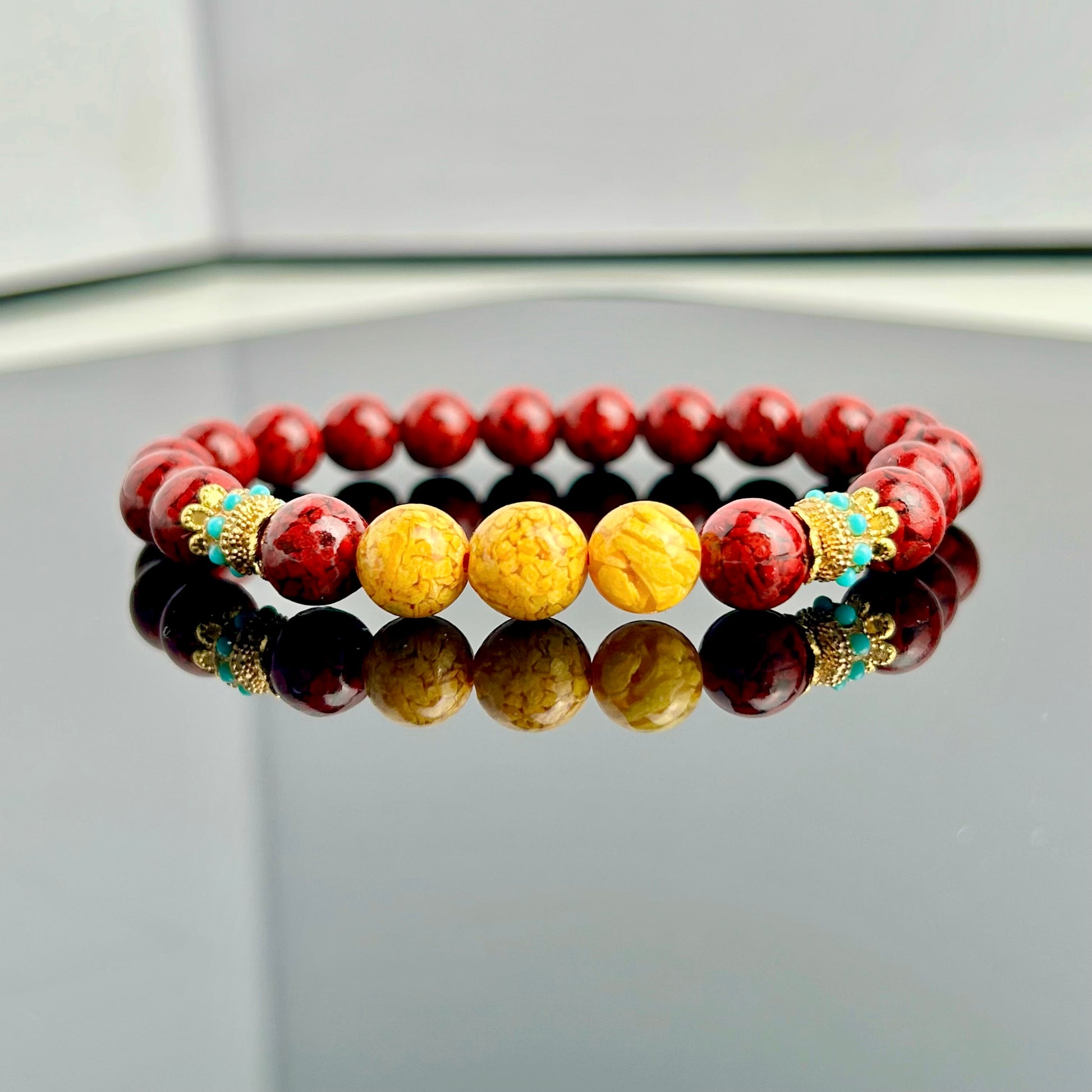 cinnabar bracelet with sunstone decor